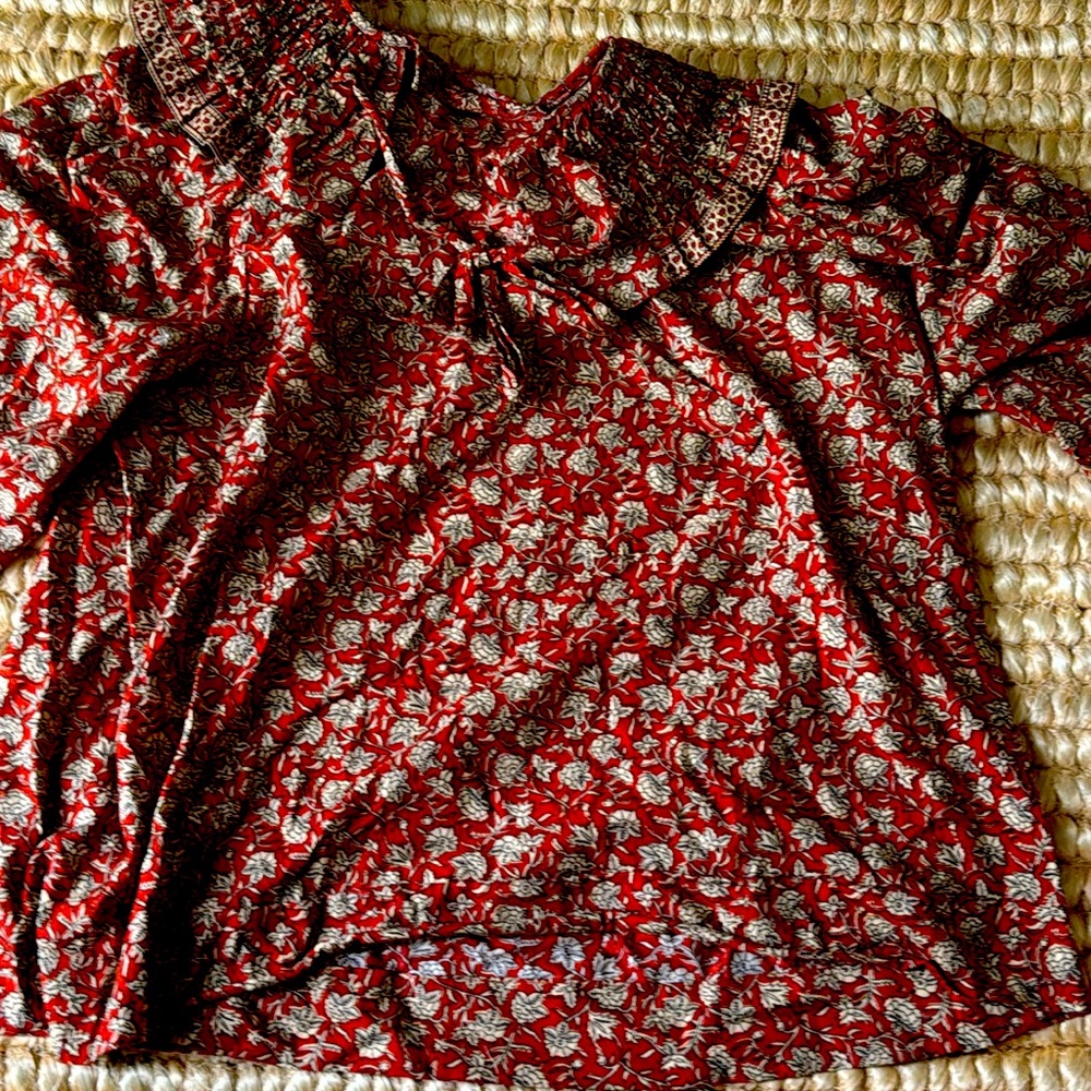 Red and white flower blouse
